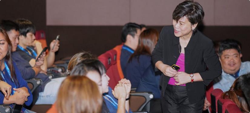 Adeline engaging leaders during the session
