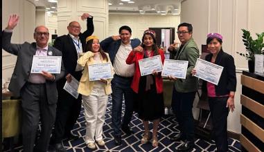 Participants with their certificates after the session
